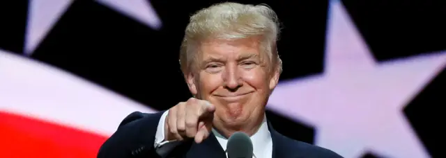 Republican presidential nominee Donald Trump gives a thumbs up during his walk through at the Republican National Convention