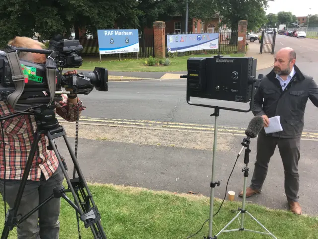 Television cameraman with television reporter Ben Ando