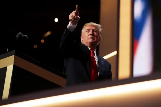 Republican presidential candidate Donald Trump gestures to the crowd during his speech.