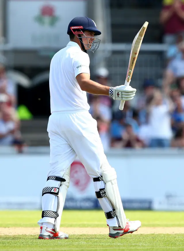 Cook reaches 50