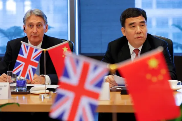 Philip Hammond and Bank of China Chairman Tian Guoli