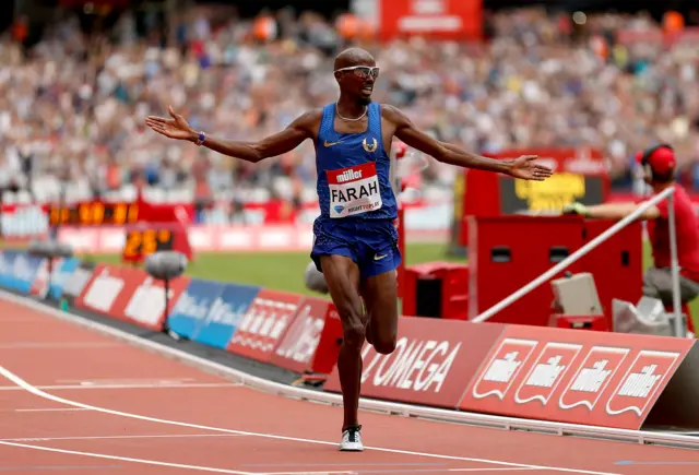 Mo Farah celebrates winning