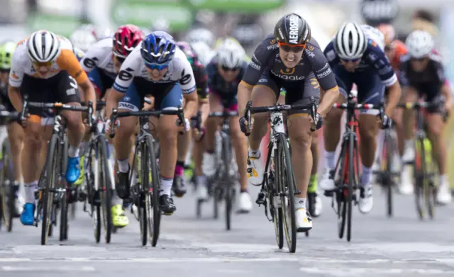 Chloe Hosking, center right, sprints towards the finish line