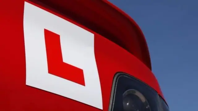 A learner driver plate on a car