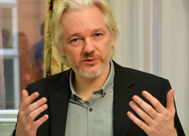 This file photo taken on August 18, 2014 shows WikiLeaks founder Julian Assange gesturing during a press conference inside the Ecuadorian Embassy in London on August 18, 2014.