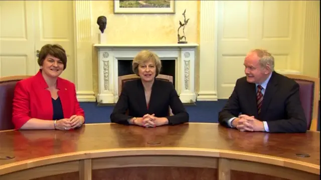 Theresa May flanked by First Minister Arlene Foster that Deputy First Minister Martin McGuinness