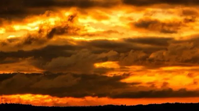 Clouds turned orange in sunset