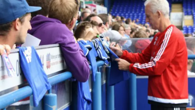 Mick McCarthy signing autographs