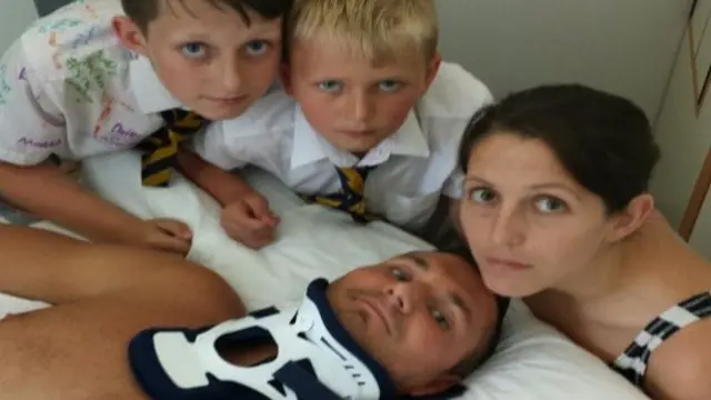 Matthew in hospital with his sons Ben and Callum and wife Nicola