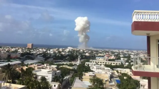 A large plume of smoke rose into the sky after the blasts