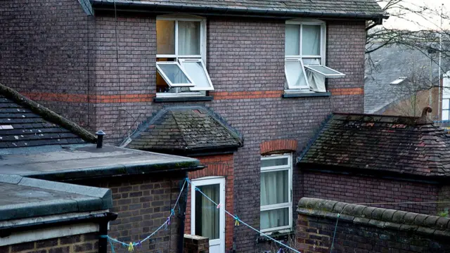 Atul Shah's Luton flat - exterior shows windows open