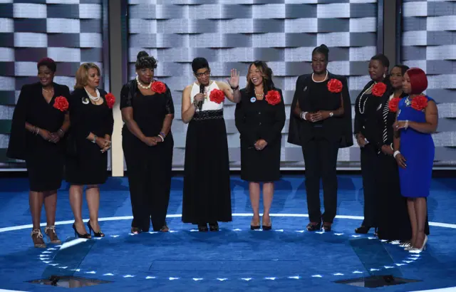 Mothers that have lost children to gun violence, part of the Mothers of the Movement group, take the stage during the second day of the Democratic National Convention.