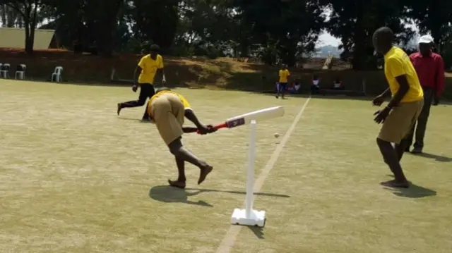 Visually impaired children playing cricket at Lugogo Sports Complex in Kampala, Uganda