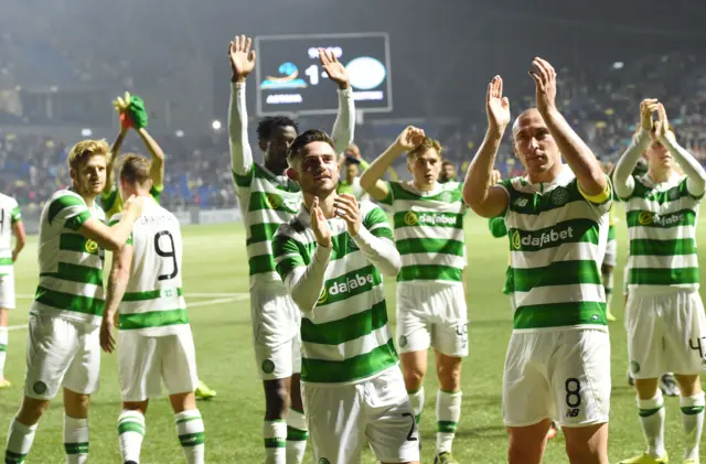 Celtic players applaud the small band of travelling fans in Astana