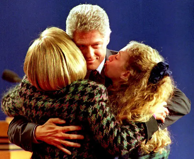 Family hug on stage in Michigan