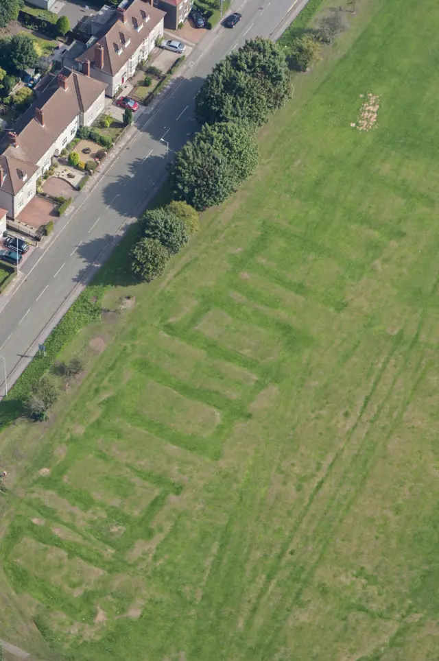 Aerial view showing show traces of a World War Two air raid shelter in Coventry's Radford Road recreation ground