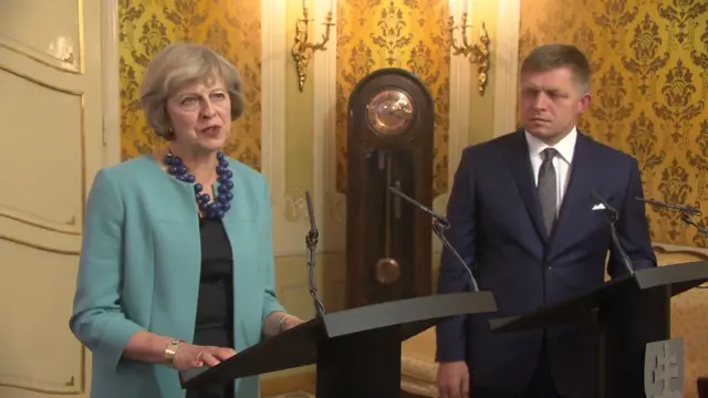 Theresa May and Robert Fico