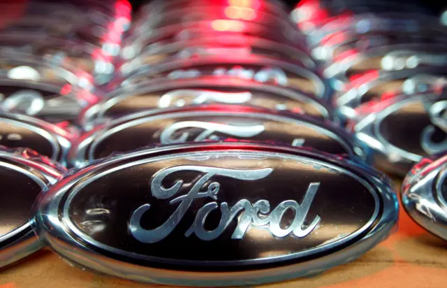 Ford logos on an assembly line