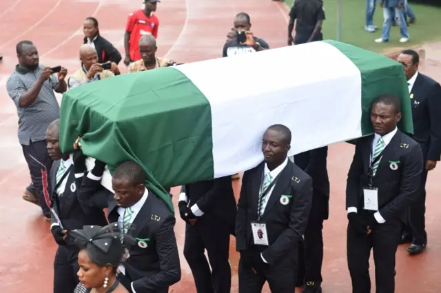 The coffin of Stephen Keshi being carried in the stadium in Benin City, Nigeria - 28 July 2018