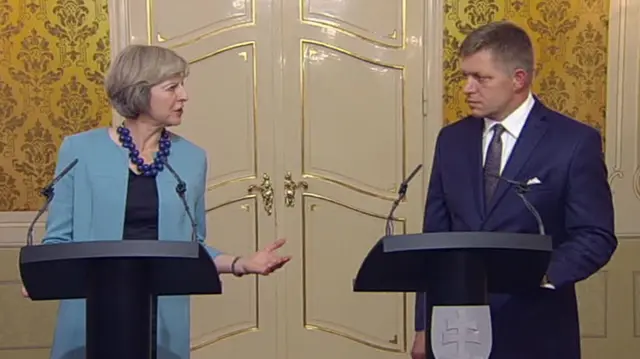 Theresa May and Robert Fico