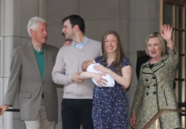 Chelsea Clinton holds her newborn son, Aidan, as she leaves hospital with her husband, Marc Mezvinsky, in New York