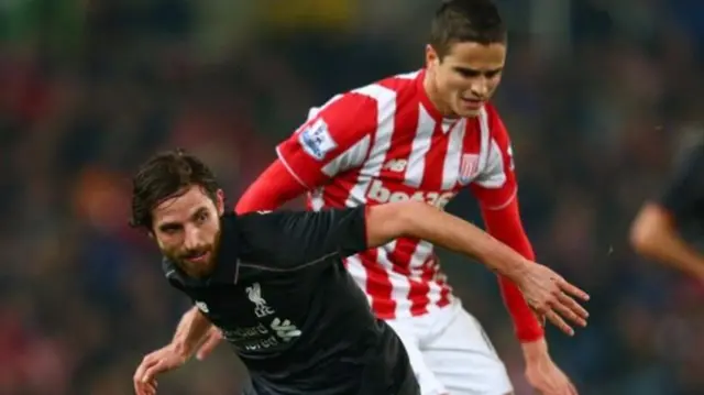 Joe Allen in action for Liverpool against Stoke City