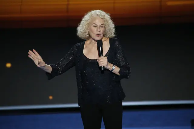 Singer Carole King performs on stage in the Wells Fargo Center on the final day of the 2016 Democratic National Convention in Philadelphia.