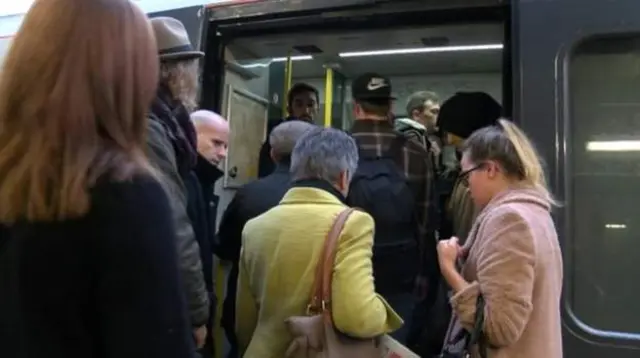 Passengers getting onto train