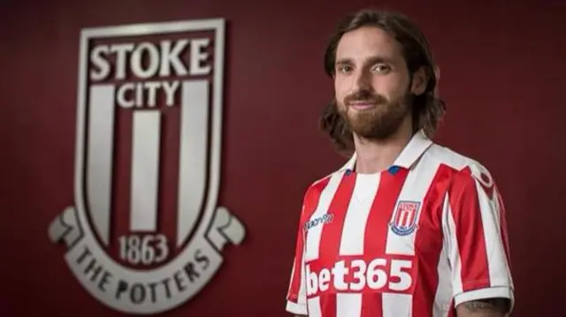 Joe Allen in Stoke City shirt on signing