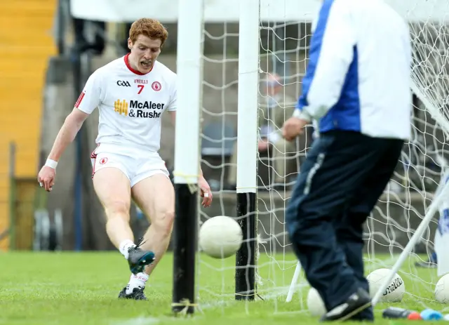 Tyrone's Peter Harte scores a goal against Cavan