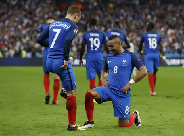 Dimitri Payet and Antoine Griezmann celebrate