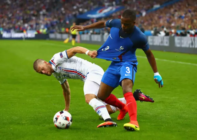 Johann Gudmundsson fouls Patrice Evra