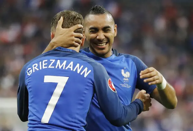 Dimitri Payet celebrates with Antoine Griezmann