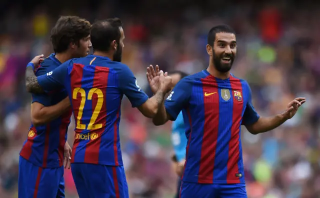 Arda Turan celebrates