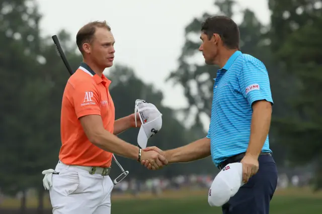 Danny Willet and Padraig Harrington shake hands