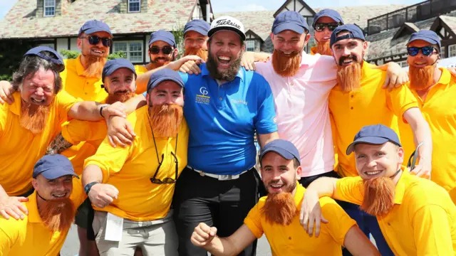 Andrew Johnston poses with fans