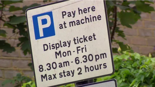 Pay here at machine sign