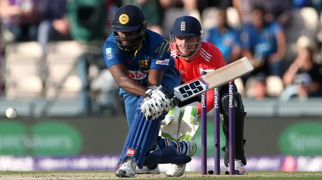 Angelo Mathews plays a reverse sweep