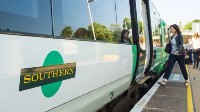 Southern train and passenger getting on