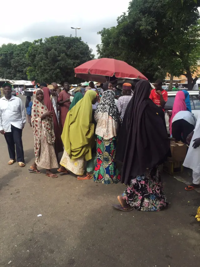 Shoppers in the market in Abuja