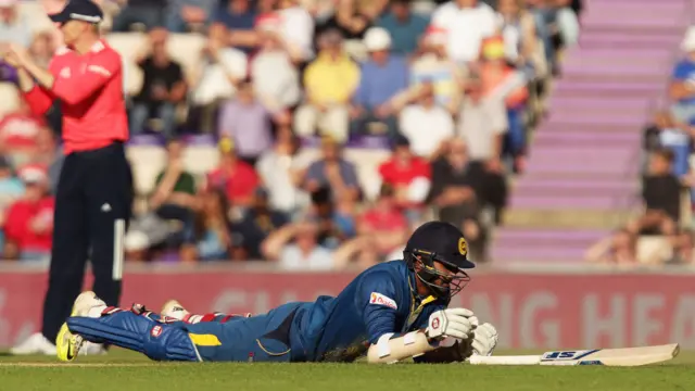 Gunathilaka avoids a run out