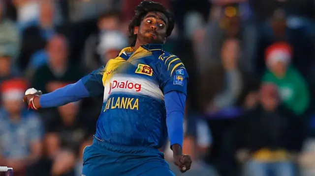 Nuwan Pradeep bowls