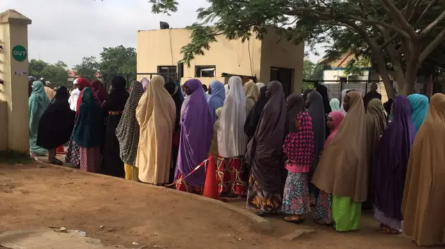 Women queuing