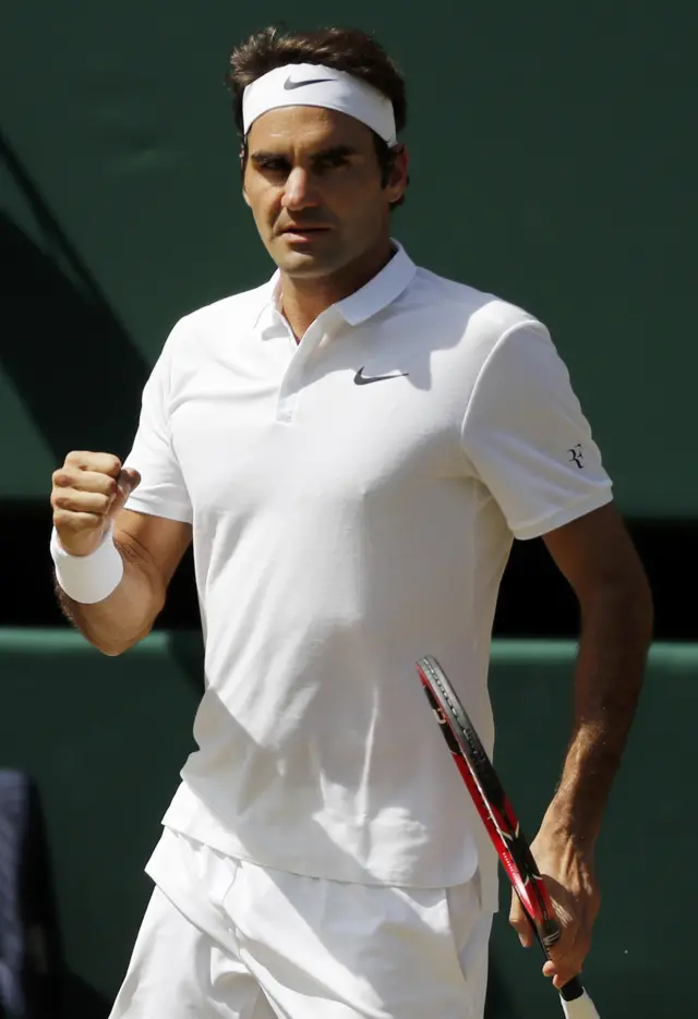 Federer holds