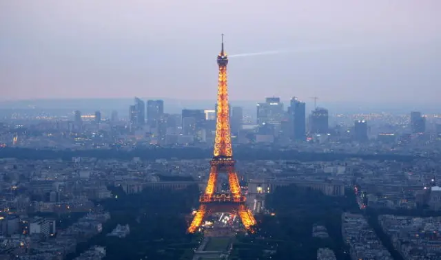 General view of Paris at dusk with the Eiffel Tower