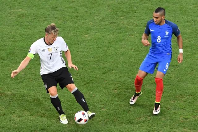 Bastian Schweinsteiger and Dimitri Payet