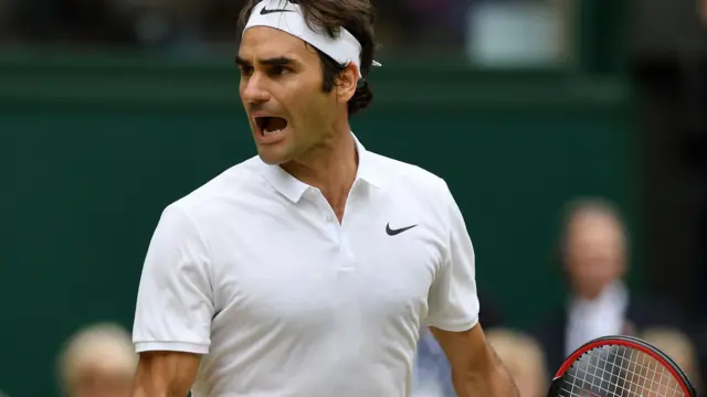 Roger Federer celebrates