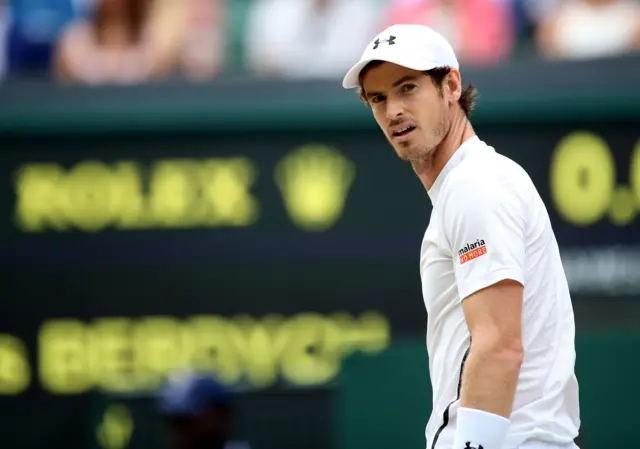 Andy Murray looks on