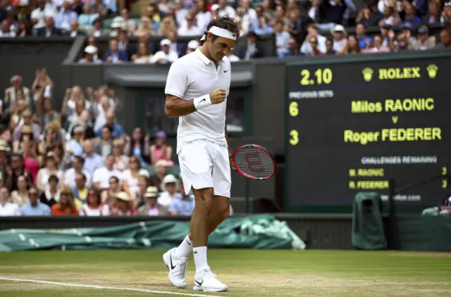 Roger Federer celebrates