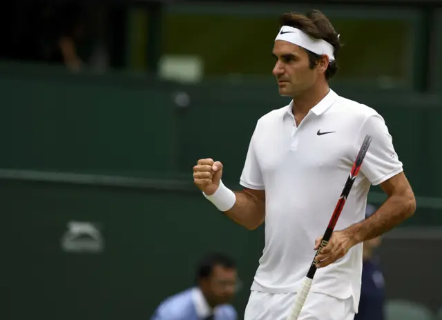 Roger Federer celebrates